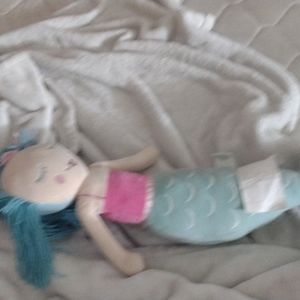 A stuffed animal mermaid